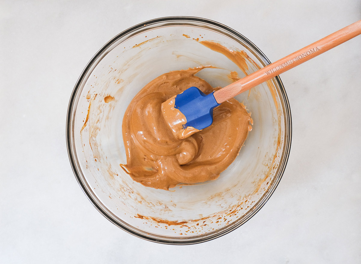 mixing mocha whipped coffee with a spatula